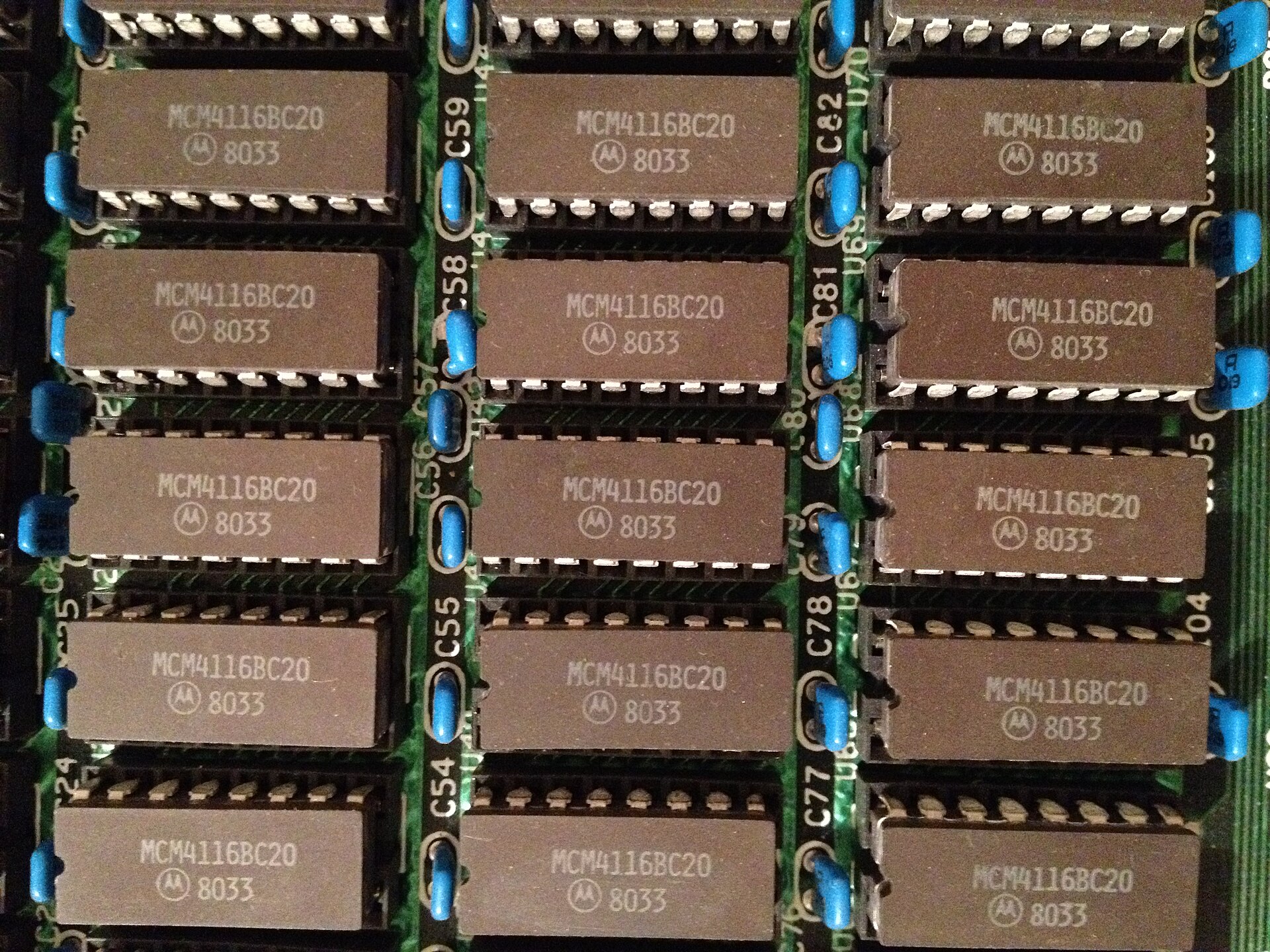 A 16K DRAM chip array — the memory-manufacturing domain where Sandhu's ~1,300 patents live.