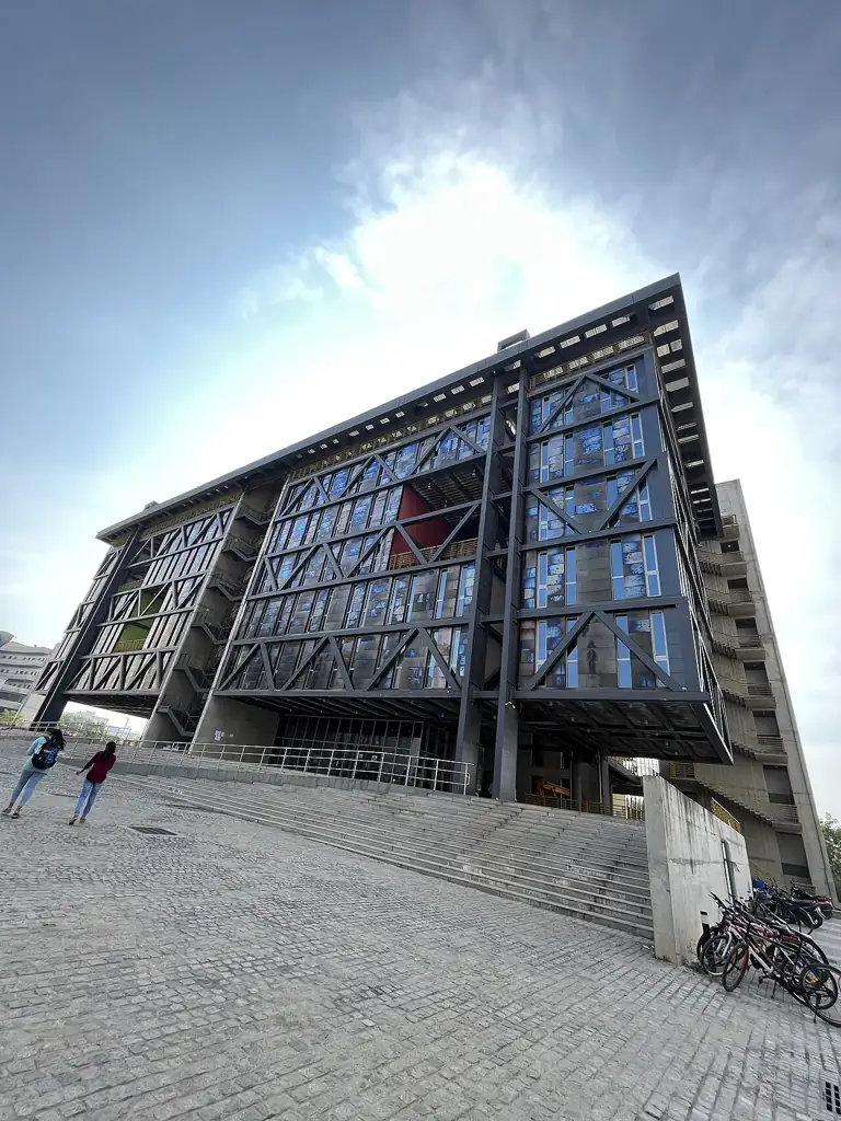 An academic block at IIT Hyderabad with a braced glass facade and wide steps